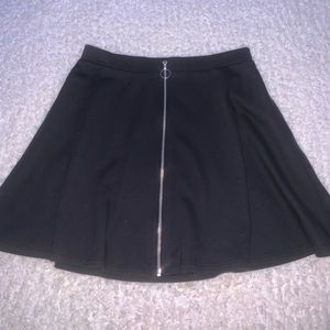 black skirt with zipper in the middle